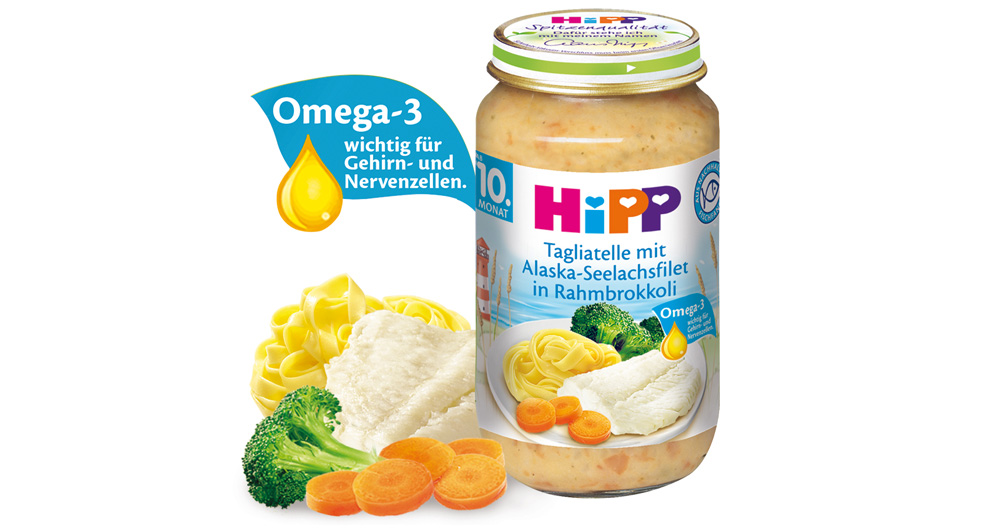 Burciņa ar bērnu pārtiku, kurā galvenā uzmanība pievērsta omega-3 taukskābēm un kurā ir dārzeņu un zivju maisījums.